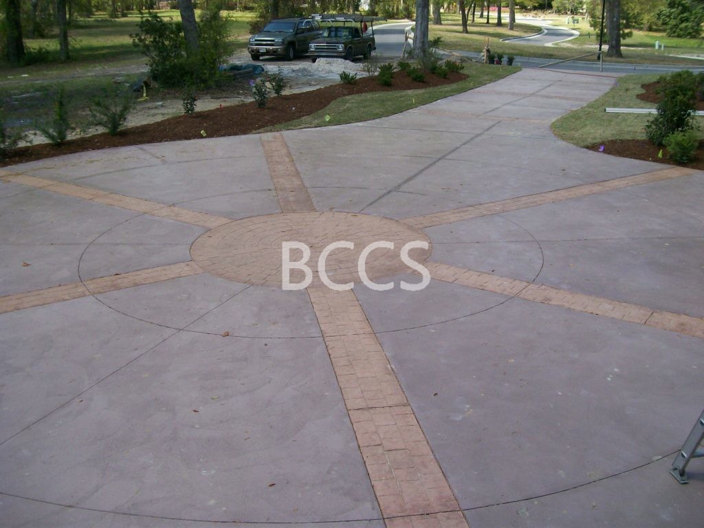 Craftsman Trowel and Stamped Colored Concrete Driveway