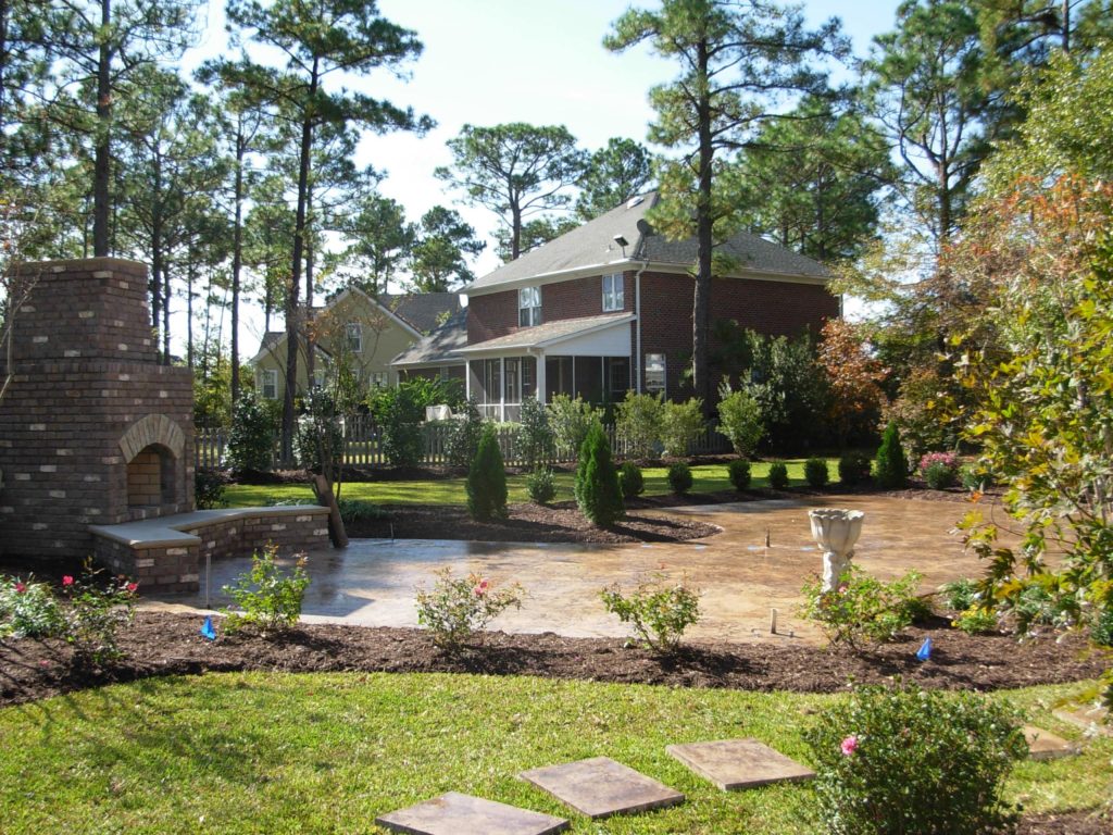 Sika Scofield Integral Color Patio Custom Outdoor Spaces, Patio, Fireplace, Stepping Stones